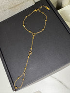 Golden Lily – Hand Chain Noir Blossom